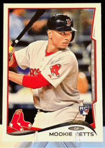 A photo of an ungraded Mookie Betts rookie card with the RC patch. 