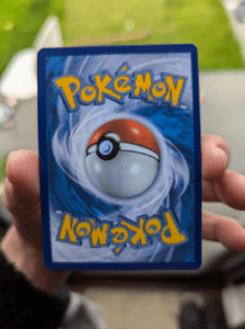 Photo of the back of a mis-cut Pokemon card