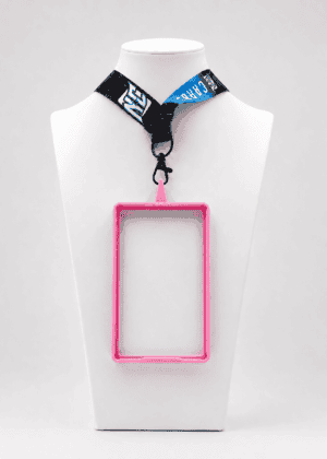 A photo of a NCASE CARDS Pink Lanyard Frame.