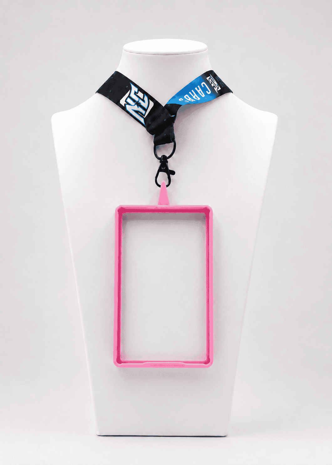 A photo of a NCASE CARDS Pink Lanyard Frame.